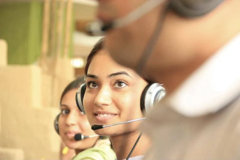 Customer support team wearing headsets