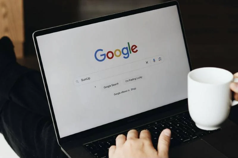 Laptop showing a search engine page